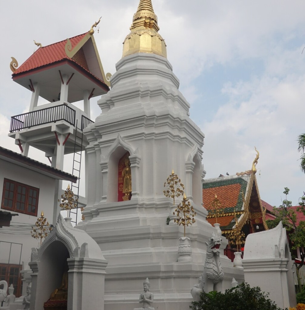 All white, modern chedi at Wat Fon Soi, Chiang Mai, Thailand