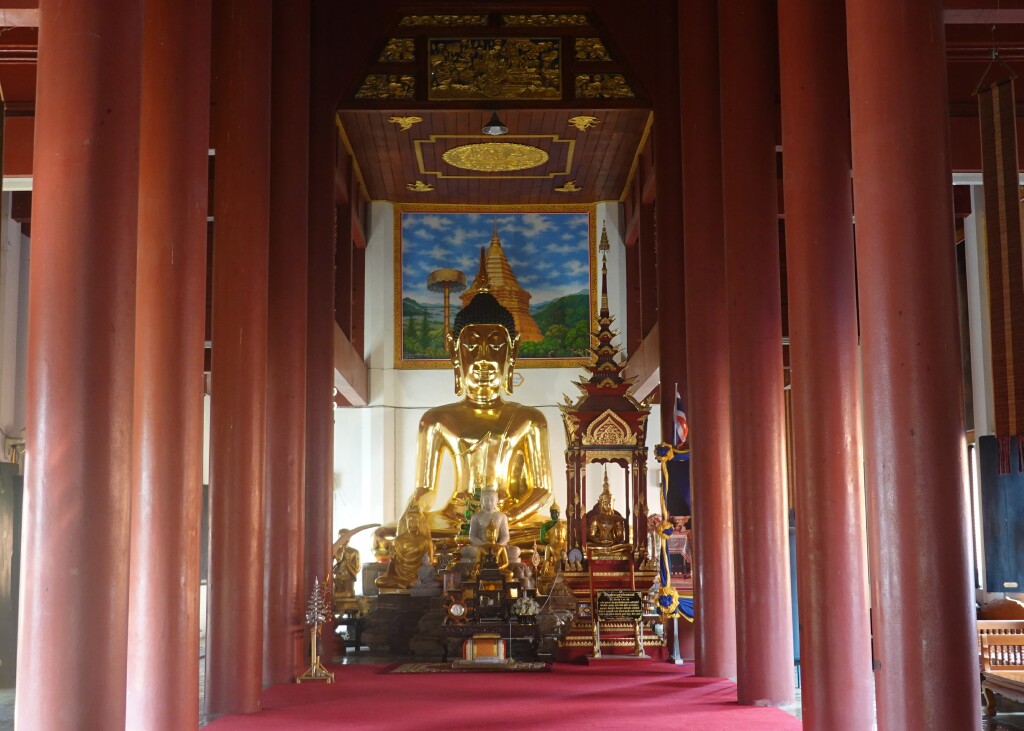 Dark red columns in the viharn at Wat Jed Lin, Chiang Mai, Thailand